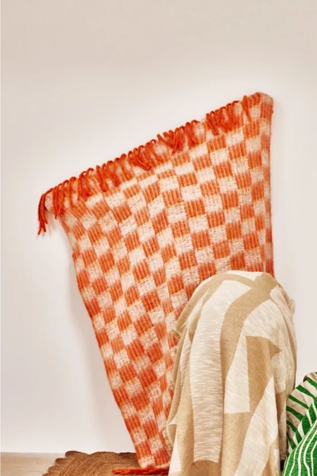 Oliver bonas cost orange throw 

#LTKhome