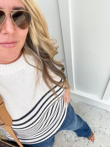 Loving this striped puff sleeve shirt sleeve sweater with the cutest gold buttons on the shoulders! I found it on sale a few places too. And these are my new favorite flare jeans. They all fit true to size but both do run a bit big (and the jeans have stretch) so order your smaller size if you’re between. I’m 5’9” and could still wear a taller shoe in the regular length jeans!
.
#ltkover40 #ltksalealert #ltkfindsunder100 #ltkstyletip #ltkseasonal #ltkhome #ltkmidsize #ltkfindsunder50 #ltkworkwear coastal fall outfits, j crew skinny flare jeans, nautical vibes, striped sweater, long jeans

#LTKmidsize #LTKover40 #LTKsalealert