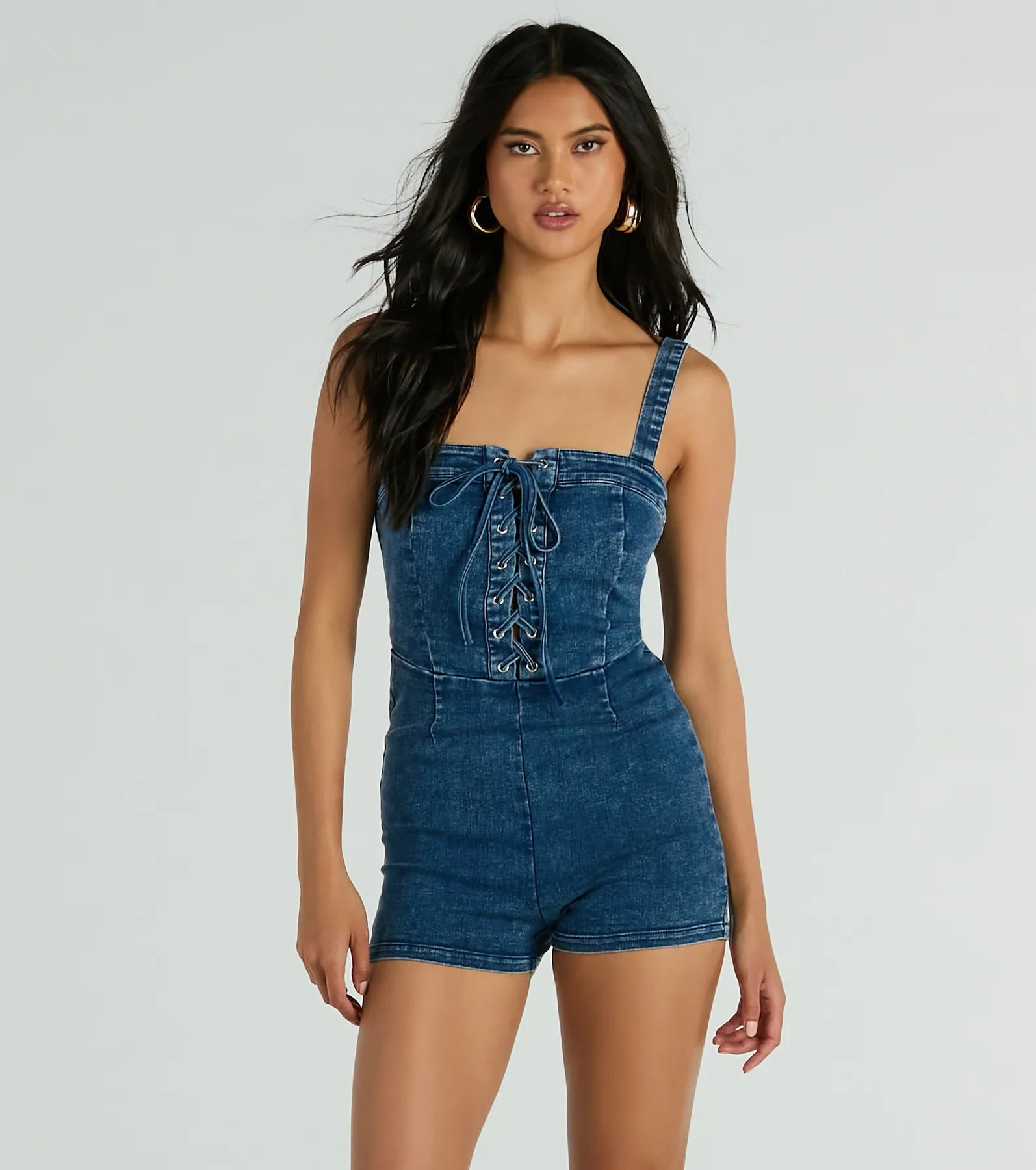 Enticing Flirty Sleeveless Lace-Up Denim Romper | Windsor Stores