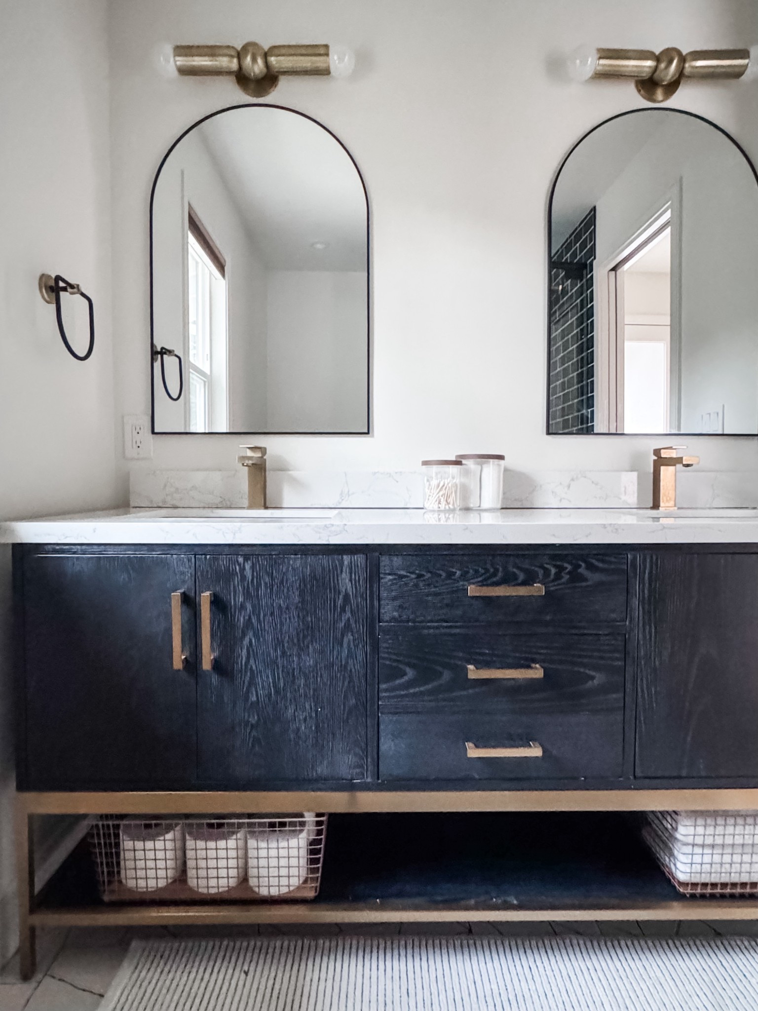 Patience is important when it comes to finding just the right storage items … and especially when you have an open, visible space you’re working with. This bathroom has an open shelf under the vanity and I found the perfect basket, but it took some time. These not only fit perfectly … they are the same color as the vanity details as well. LOVE! Video coming soon!

#LTKHome