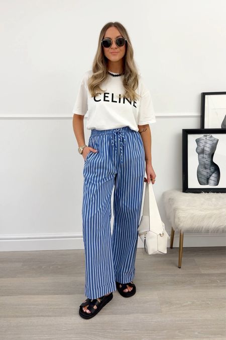 Blue striped trousers are the ideal comfy and casual trouser for holidays and warmer weather! 
Mine are a petite size 8.

T-shirt is xs



#LTKfindsunder50 #LTKsalealert #LTKstyletip