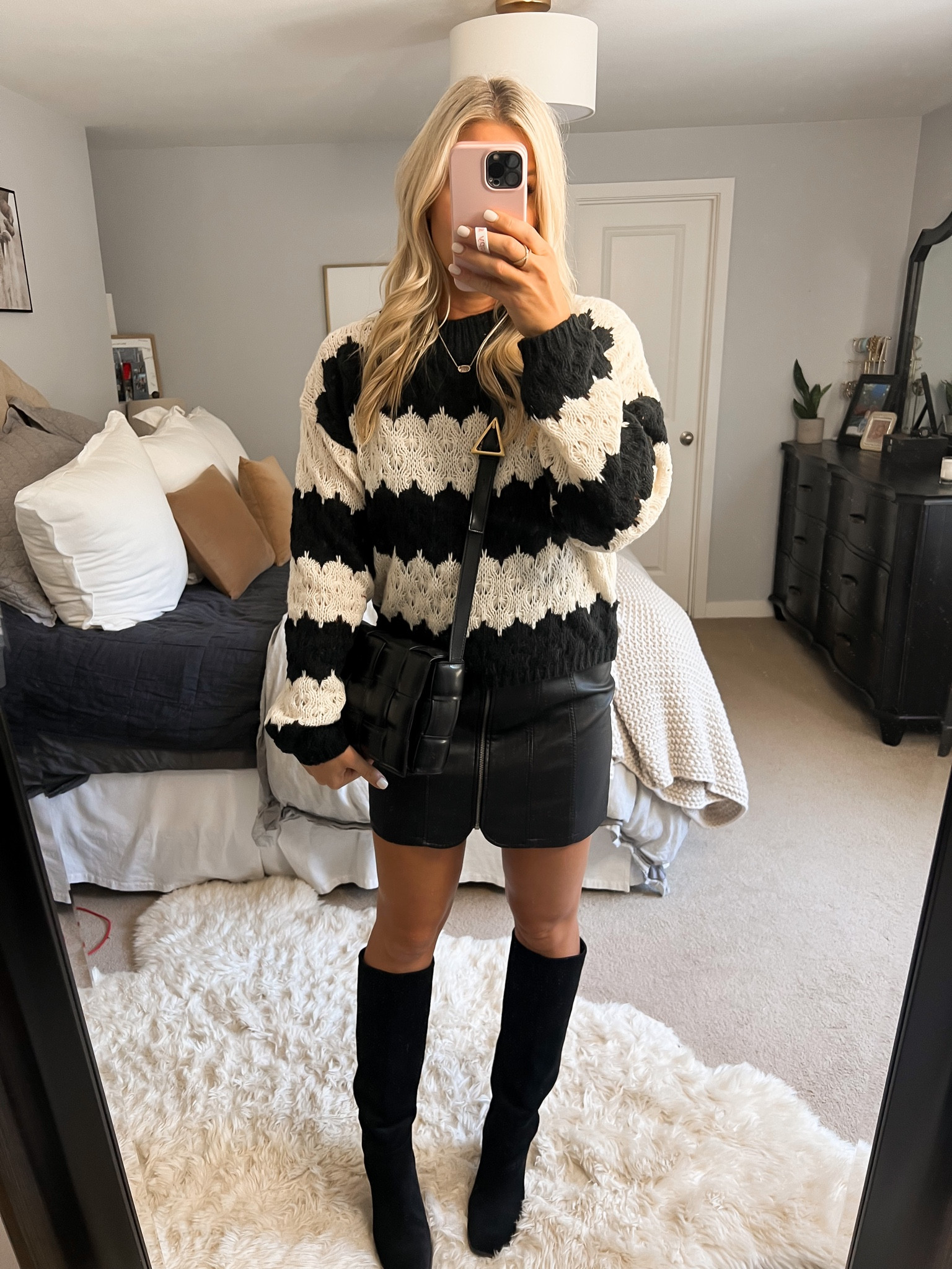 Sweater 
Leather skirt 
Knee high boots 
All tts 
#competition 

#LTKSale #LTKunder100 #LTKstyletip