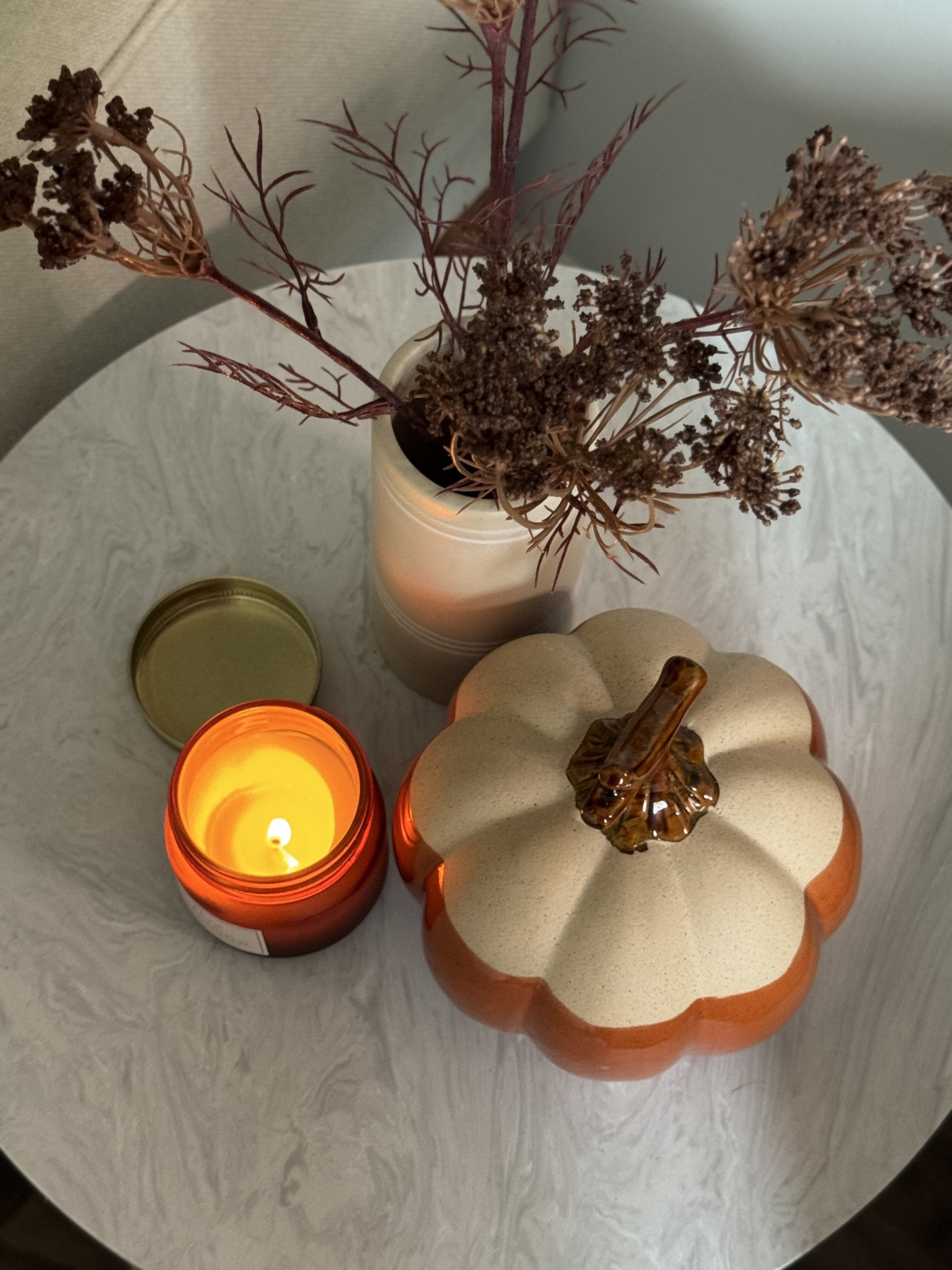 Fall decor on our little coffee table 