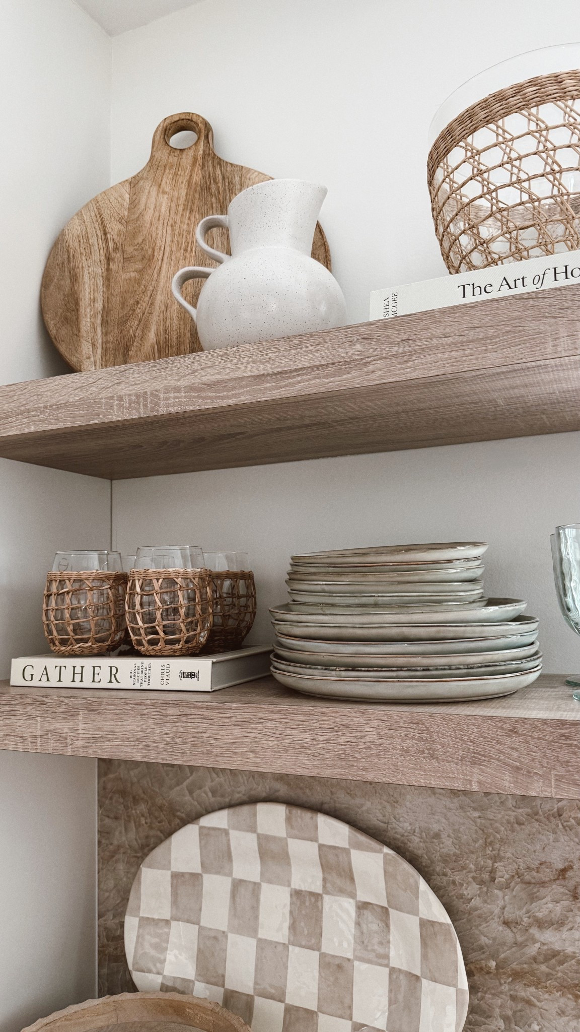 Kitchen shelf styling inspo 🍽️
love these neutral fresh tones for spring & this cute little “gather” cookbook I found on Amazon for pretty shelf styling ✨

#shelfstyling #kitchen #kitchendecor #kitchenshelf #dinnerware #glassware #cookbook #recipebook #coffeetablebook #amazon #amazonfind #amazonhome #potterybarn #seagrass #modernorganicdinnerware #cuttingboard #springdecor 

#LTKFindsUnder50 #LTKHome #LTKSeasonal