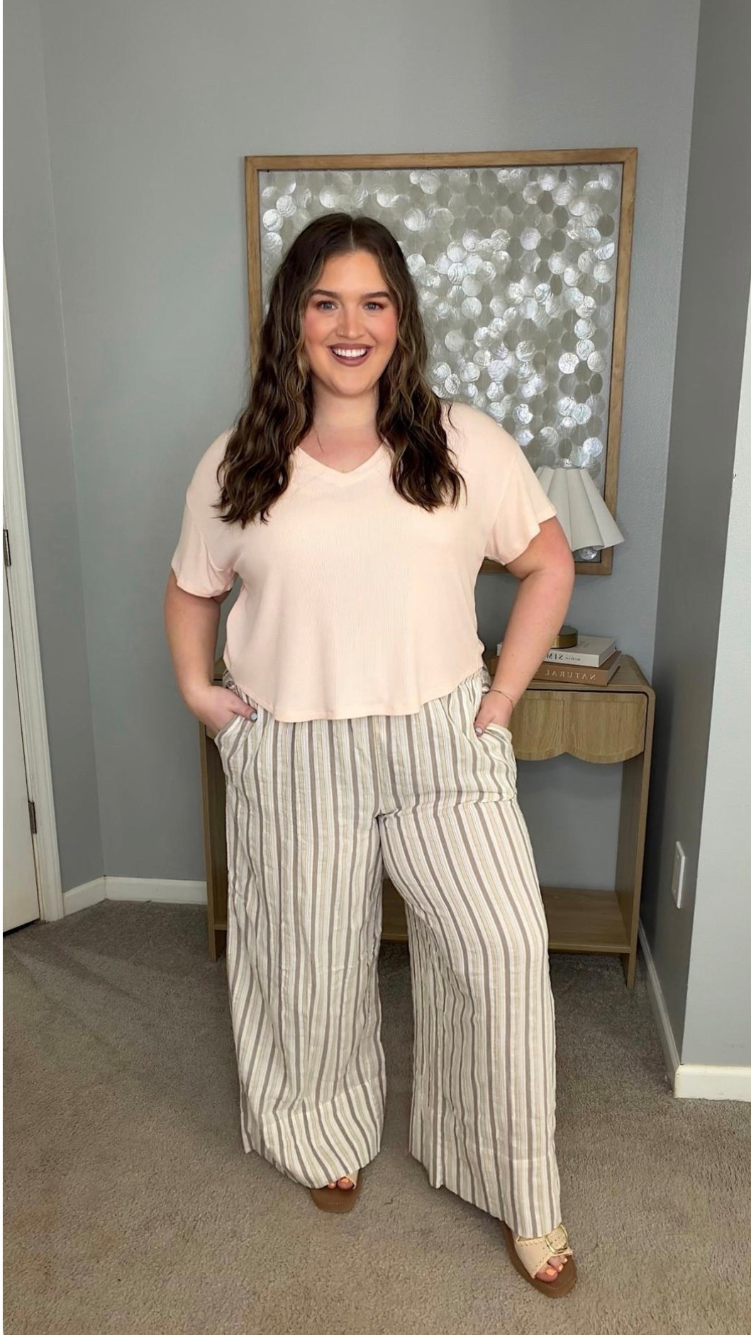 I’m loving this plus size friendly casual spring outfit. I’m wearing a size XL top and an XL pair of pants, I love how flattering these plus size approved pants are. This look is spring perfection with the soft colors and stripes. 
Casual spring outfit

#LTKSeasonal #LTKPlusSize #LTKOver40