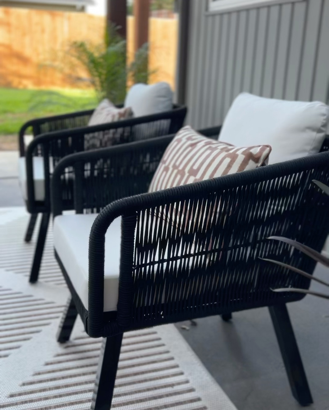 MAJOR SALE💥 Wanted the patio to be cohesive with the living room through the big window. Never ever thought I would buy black & white outdoor furniture, but this set ended up being total perfection.  It’s a smaller set and great for apartment balconies too. 

Comes in grey as well. 
Sturdy and comfy yet firm. 

It comes with a table but I wanted to add the tone and texture of the wood table. 

#LTKSeasonal #LTKHome #LTKSummerSales