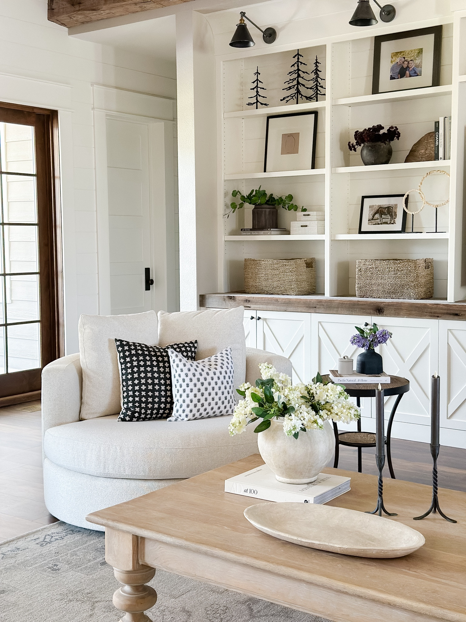 The lilacs are blooming!  These faux stems are incredibly realistic!  I use them year after year!  Worth the investment!  
Use code AFLORAL to save 10% off!
Living room
Coffee table 
Swivel Chair
Reclaimed wood table
Built it shelf styling

#LTKstyletip #LTKover40 #LTKhome