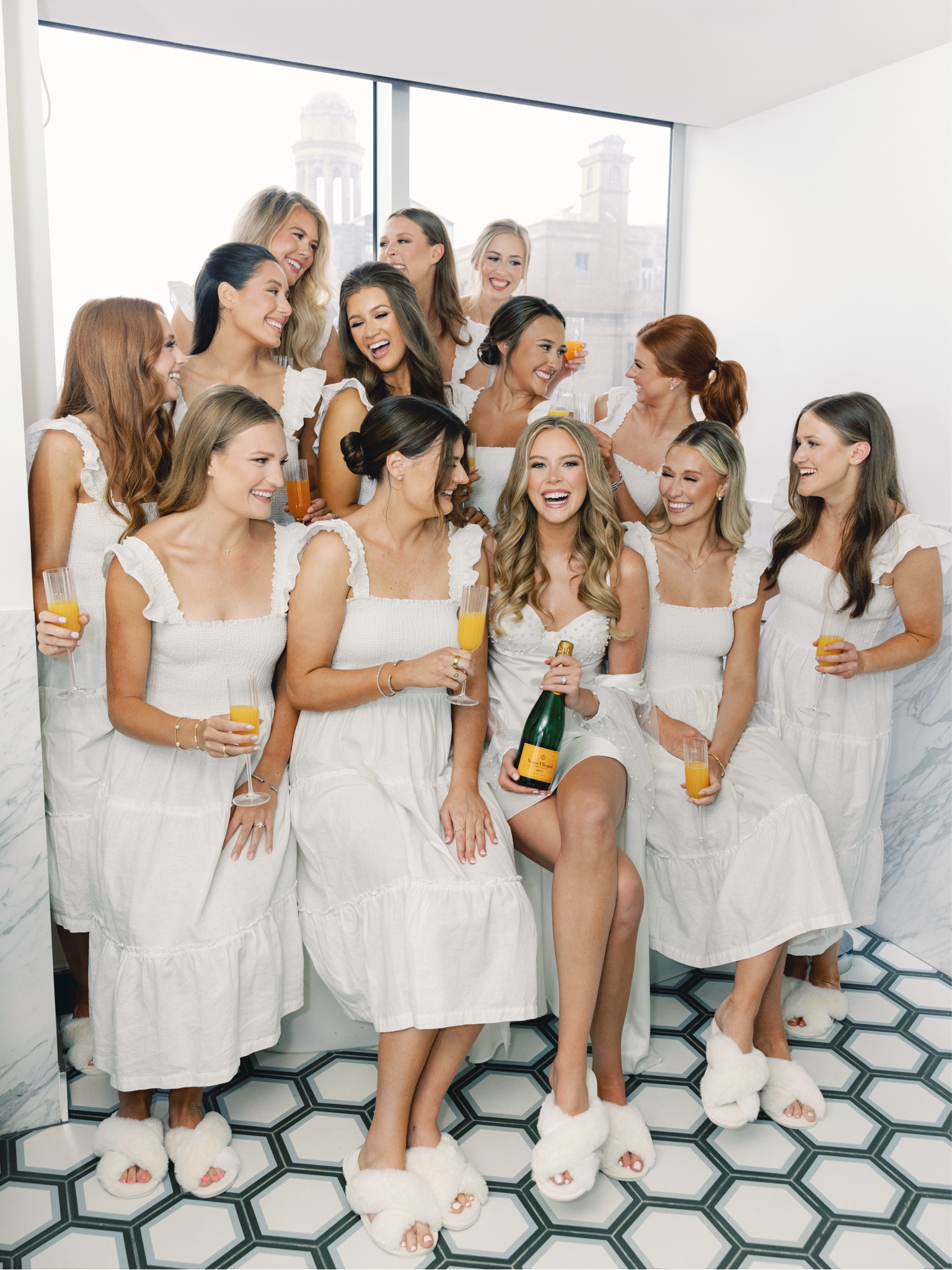 Opted for smocked dresses rather than pjs for my girls to get ready in and so glad I did! Bought on sale from Saks off 5th! Linking similar options and accessories | bridesmaid dresses, bridesmaid getting ready outfits, wedding, white dresses, bride style

#LTKwedding #LTKfindsunder100 #LTKstyletip