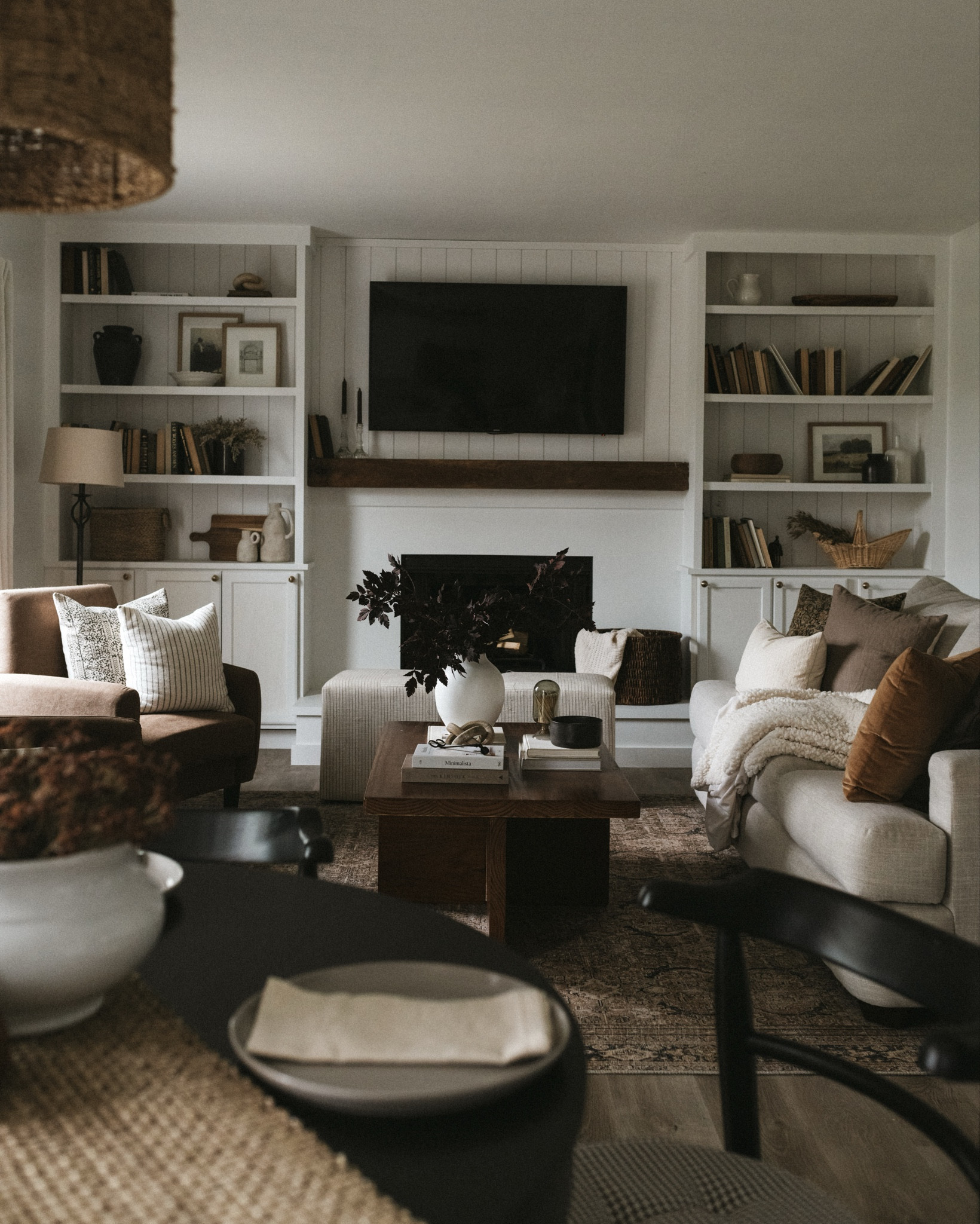 Fall living room, fall inspo, fall decor, cozy living room, white living room, built in shelves, living room built ins, living room shelves, shelf decor, shelfie, shelf styling ideas, coffee table decor, coffee table styling tips, console table decor, breakfast nook decor, black round dining table, dining table decor, neutral home, neutral living room, neutral home decor ideas, how to decorate for fall, classy fall decor ideas, beige couch, black dining chairs, brown accent chairs, large area rug, living room rug

#LTKHome #LTKSaleAlert #LTKSeasonal