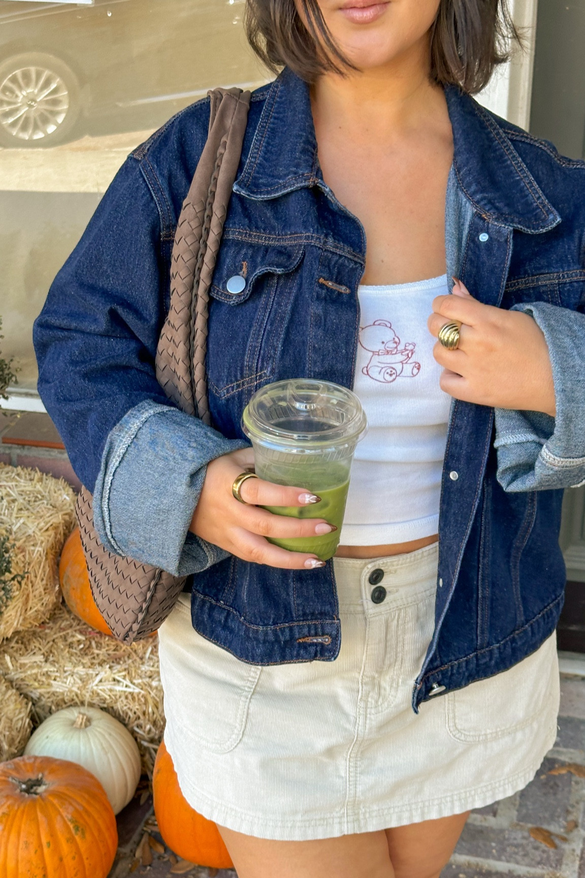 love this ootd 🧸🍂 wearing a S-M in the jacket. Skirt is old Abercrombie but linked similar - I'm a M/US 8. // fall outfits, graphic tank top, denim jacket, fall denim outfit, mini skirt 

#LTKMidsize #LTKFindsUnder100