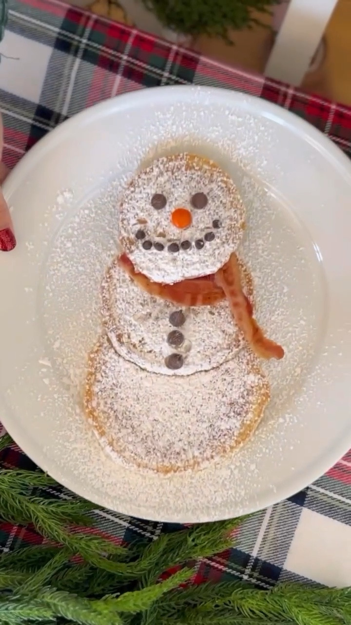 Easy Christmas breakfast tradition! ✨ Easy Snowman Pancakes! ☃️🥞 All you have to do is arrange a stack of adorable Snowman Pancakes made with Krusteaz Buttermilk Pancake Mix! Three fluffy pancakes become a snowman with a crispy bacon scarf. Chocolate chips make the eyes and buttons, a mini orange candy for the nose, and more chocolate chips or sprinkles for a cheerful smile. A dusting of powdered sugar completes the snowy scene!  

#LTKWatchNow #LTKHoliday #LTKSeasonal