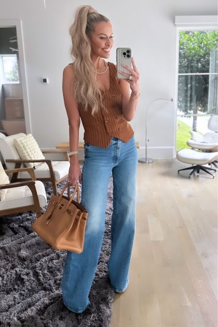 Okay we need to talk about these jeans….The Mother Hustler Heel is the style name and if you see them in your size, buy them asap. They’ve got the shape of a trouser, but are in this perfectly stretchy structured denim. They run true to size (I’m in a 26) and have a 34 inch inseam, so I’m wearing a big 5 inch platform! Linked them in lots of colors & different retailers, some on sale! I’m buying the white ones right this second. 

#LTKsalealert #LTKstyletip #LTKFind