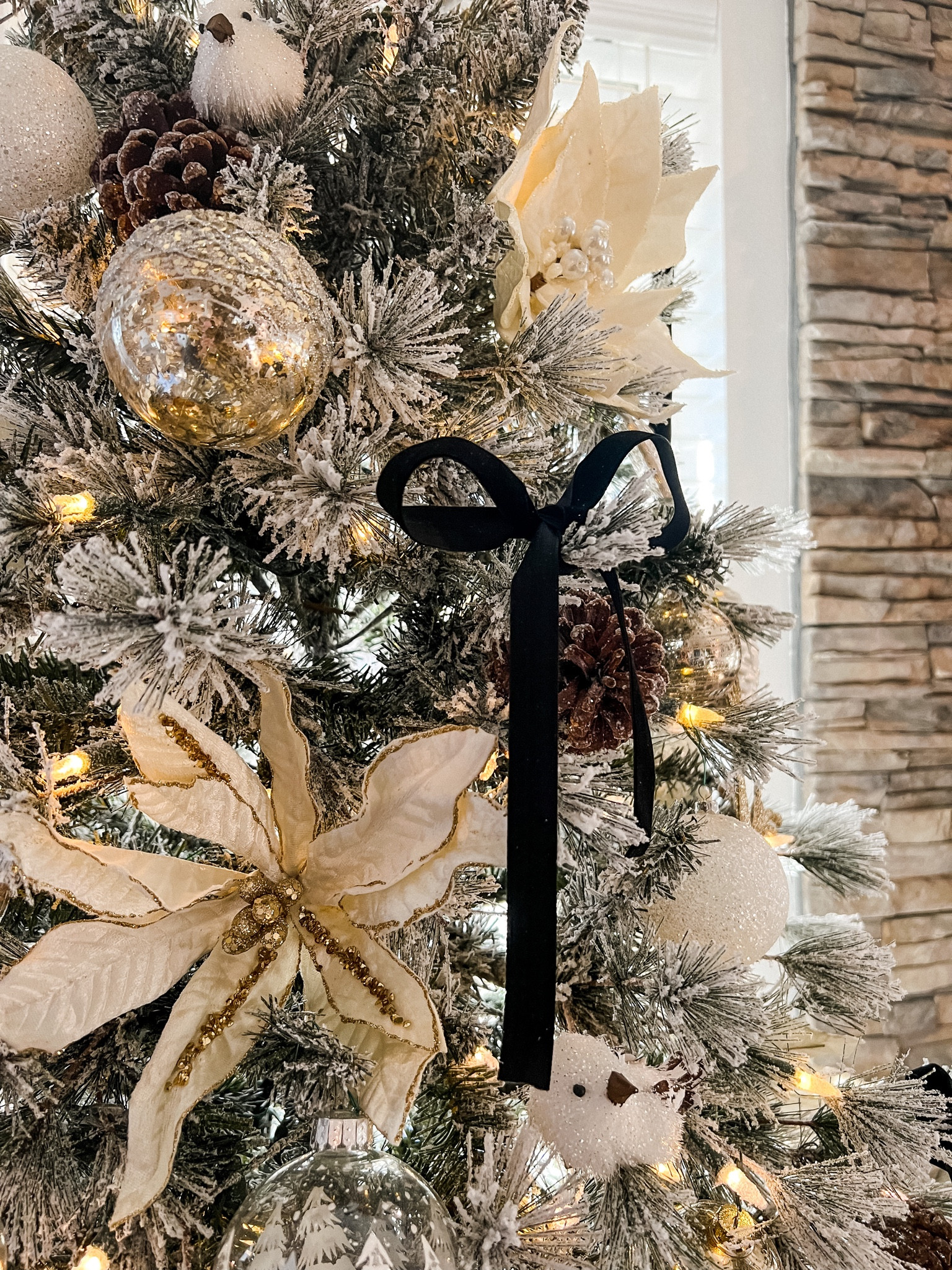 Added black velvet ribbon to our Christmas tree this year and I love the contrast that it adds 🎄✨ Christmas decorations - Christmas decor - holiday party

#LTKunder50 #LTKSeasonal #LTKHoliday