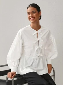 Oxana Women'S White Cotton Peplum Blouse With Balloon Sleeves And Front Bow Closure | SHEIN