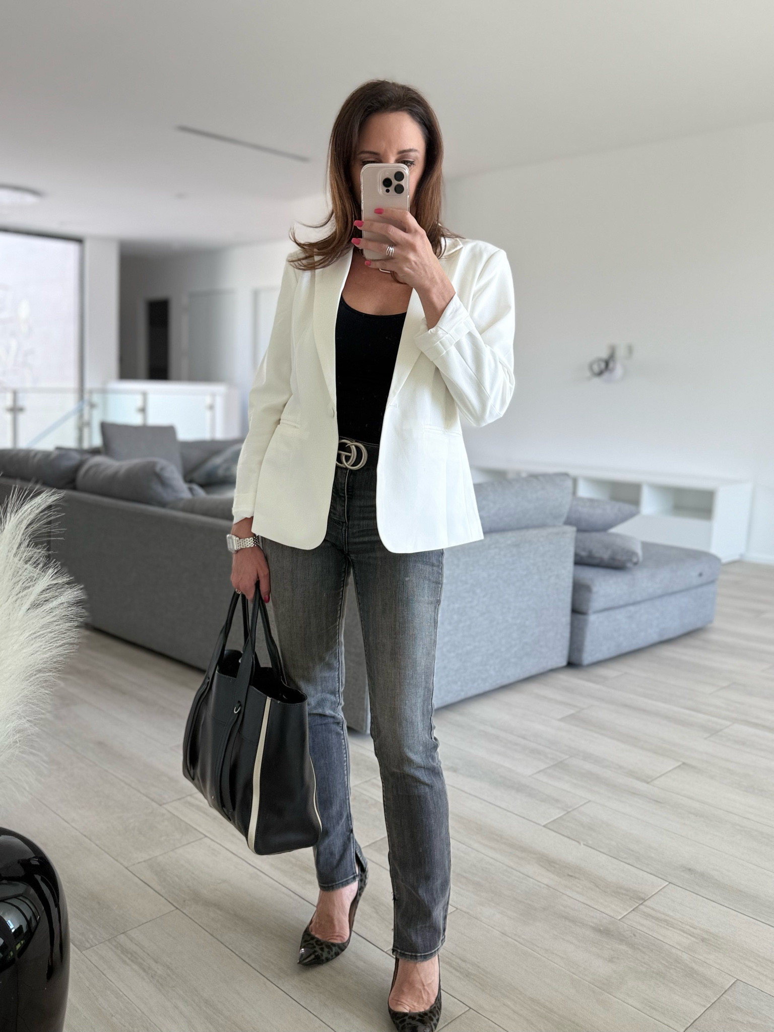 Classic black and white! These washed out black denim jeans are the perfect straight leg fit with a tiny flare. 

#LTKFindsUnder100 #LTKStyleTip #LTKOver40