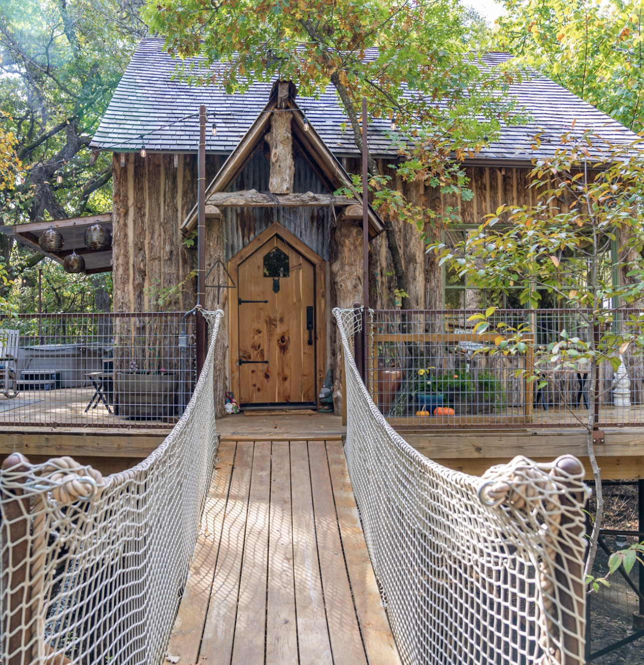 Hidden in the woods at Fuller’s Folly River Ranch, this hobbit-style treehouse sits 15 feet above the ground on a private deck overlooking its own waterfall.

🛏️ Sleeps up to 6 with 2 bedrooms + loft bunks for kids
🛁 Full bathroom with oversized shower + towels provided
🍳 Full kitchen with stove, fridge, cookware, and coffee maker
🌡️ AC + heat for year-round stays
🌉 Entry via a swinging bridge into a wraparound treehouse deck
💦 Private hot tub overlooking the forest + waterfall
🔥 Fire pit + propane grill + outdoor dining areas
🌊 Located directly on the Brazos River on a 350-acre ranch
🛶 Kayaks, paddleboards, and tubing (seasonal) included
🥾 Hiking trails, fishing spots, and wildlife around the property
🐴 On-site activities like barnyard animals, axe throwing, and a fairy forest
🐶 Up to 2 dogs allowed (pet fee required)

The entire setup is designed for a secluded stay in nature, but with full amenities so you’re not sacrificing comfort for the experience.  Weatherford texas 
