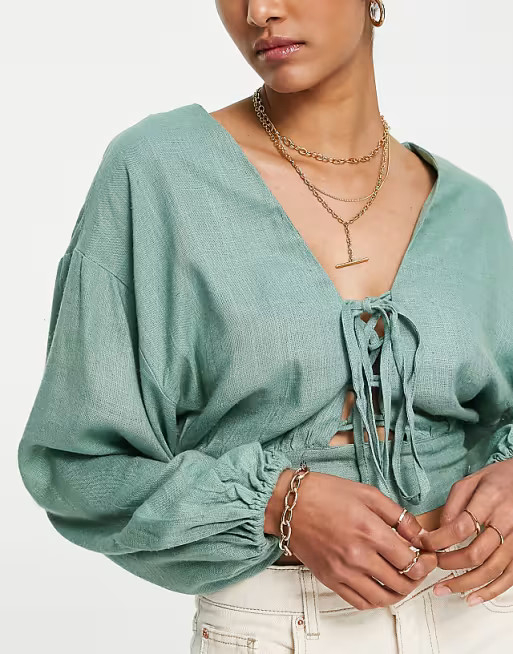 ASOS DESIGN linen top with lace up front & volume sleeves in khaki | ASOS (Global)