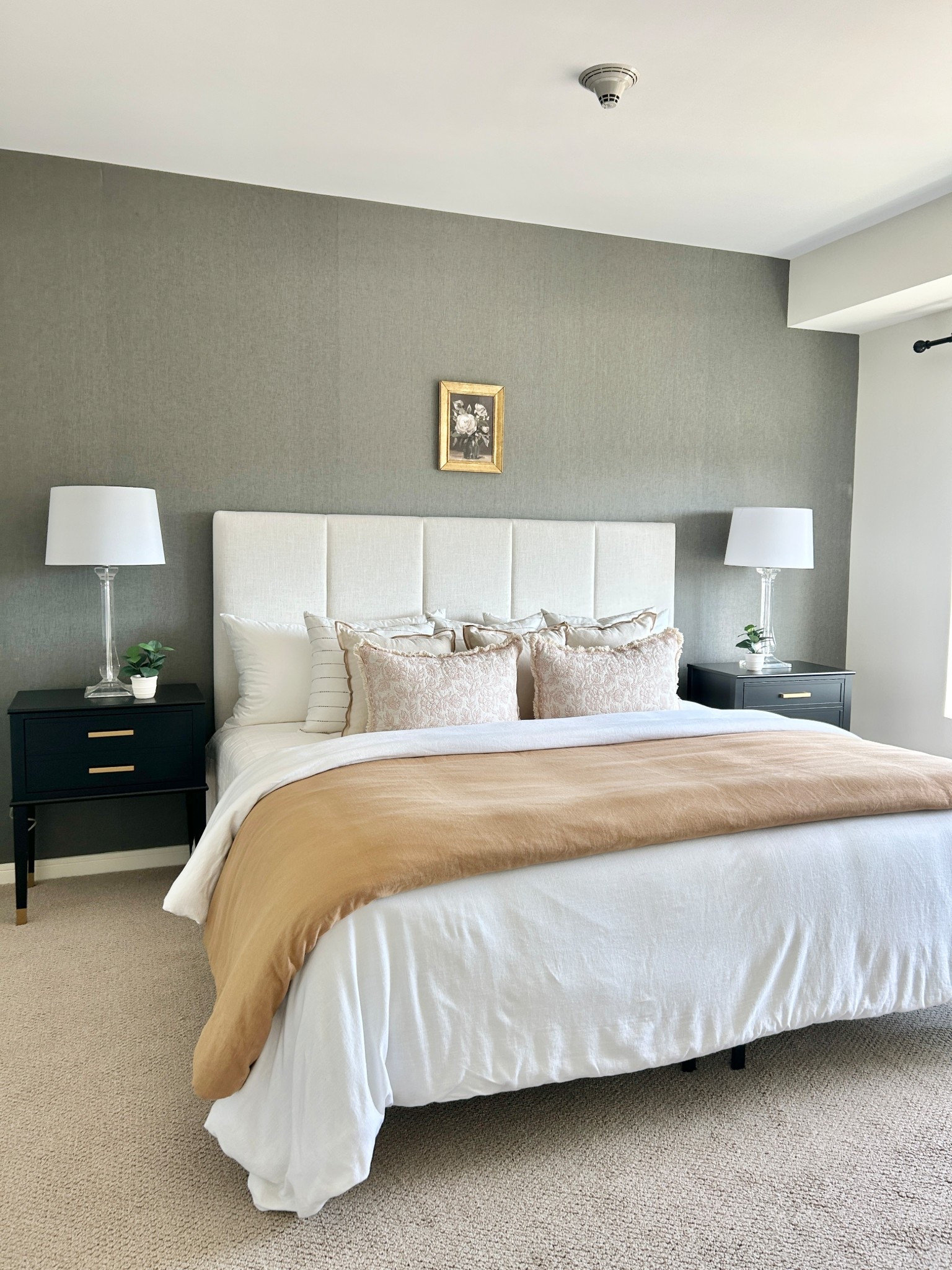 Bedroom styling, black nightstands, upholstered bed with cream bedding. 

#bedroom #nightstands #bedding 

#LTKHome