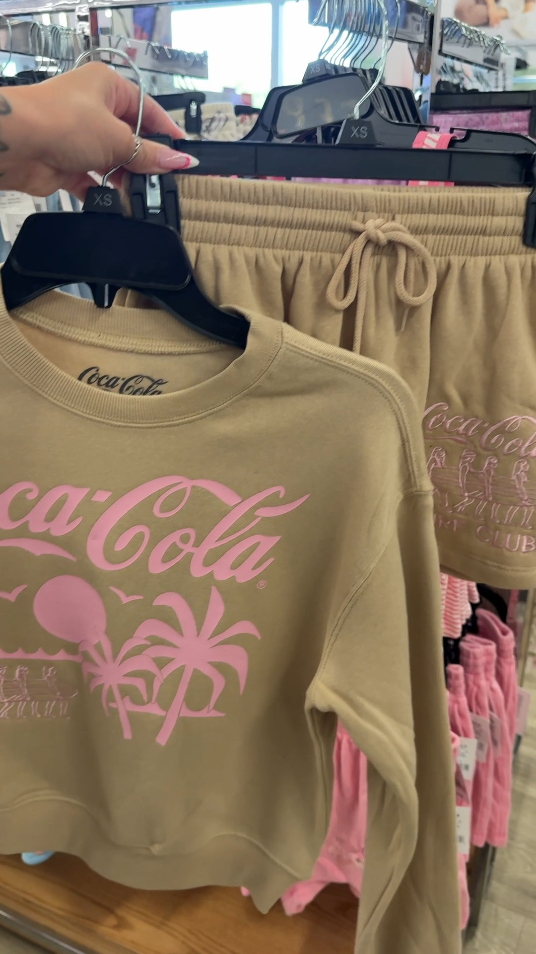 This Coca Cola crewneck and matching shorts are perfect for summer nights. I love the link pink design.

#LTKgrwm #LTKmomlife #LTKootd