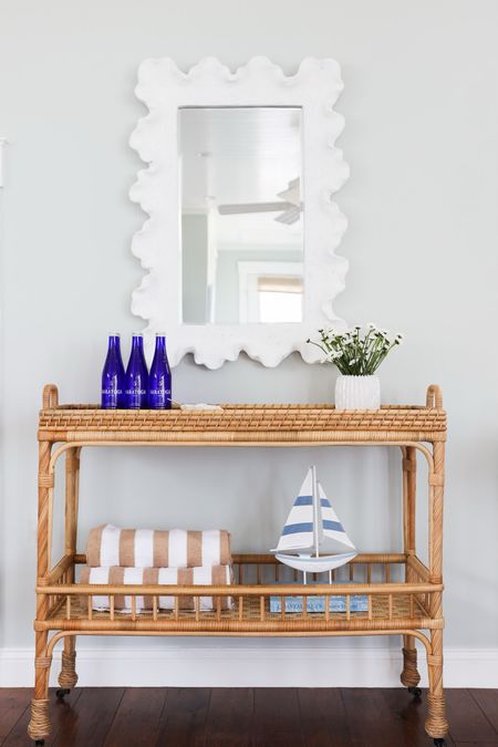 The perfect bar cart for Summer entertaining. We styled this using the rattan cart from Serena & Lily with towels from Amazon! It’s all about mixing high and low. 

Shop the look and follow @pennyandpearldesign for more home style✨

#LTKFind #LTKhome #LTKstyletip