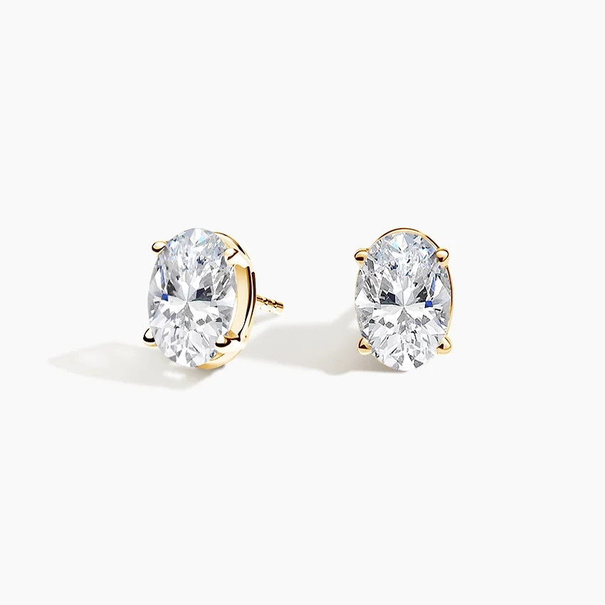 Four-Prong Oval Diamond Stud Earrings in 18K Yellow Gold | Brilliant Earth