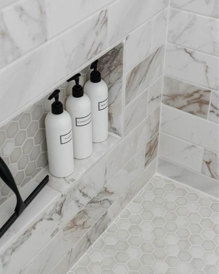 Our bathroom shower isn't complete without these refillable shower shampoo and condition bottles! These bottles come with labels and you can fill them with soap and shampoo. 

#LTKhome #LTKunder50