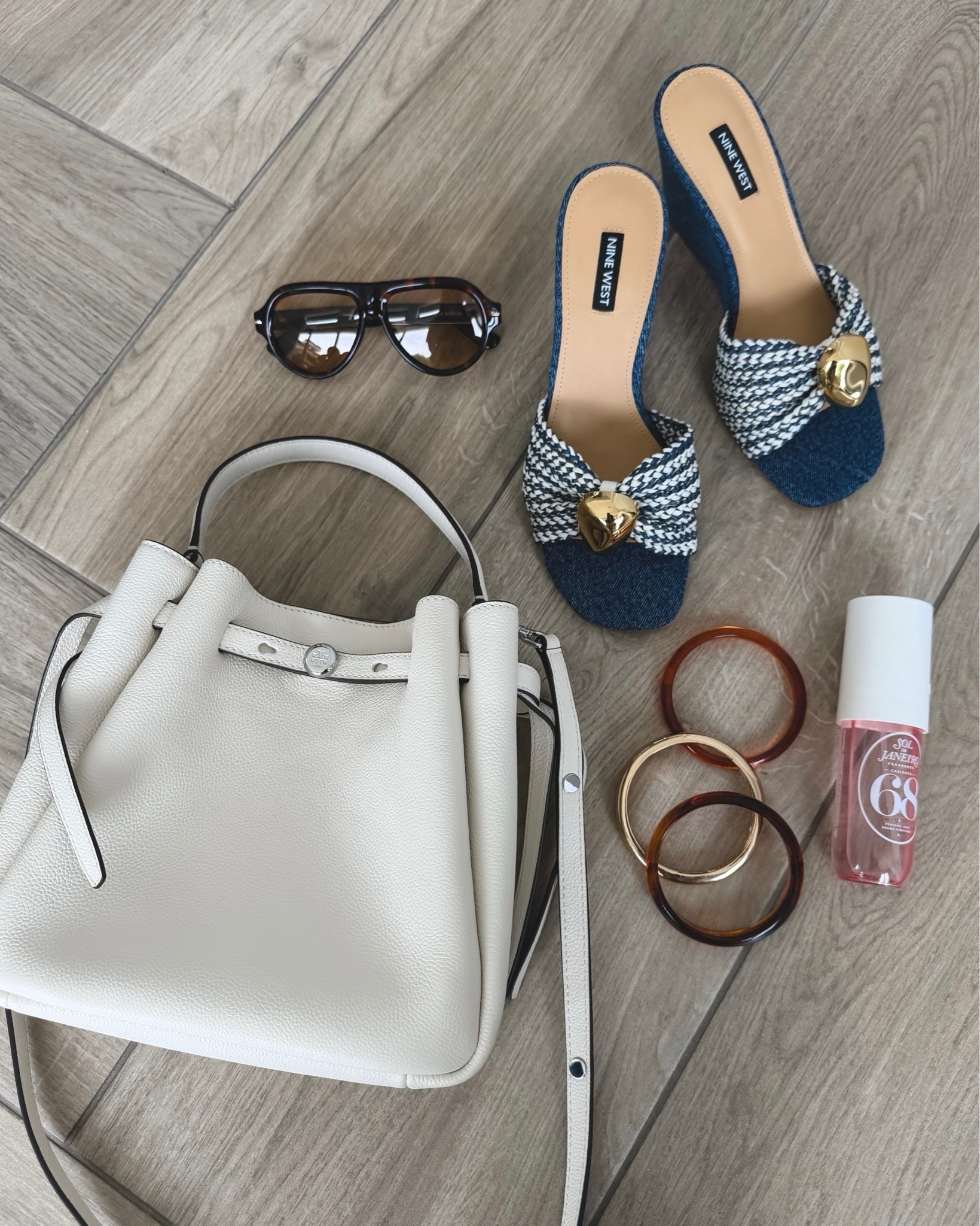 The cutest denim wedges... selling out fast, but they also come in solid natural and brown. Run tts 
Summer accessories 
Tory Burch bucket bag
Bangle set 
Sol de Janiero

#LTKSeasonal #LTKOver40 #LTKU #LTKmomlife
