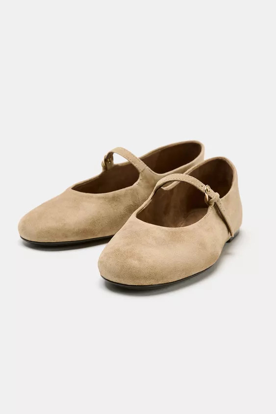 Suede ballet flats. Front strap with buckle. Round toe.Sole height: 1 cm. | Zara US