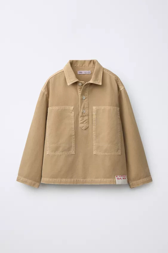 Overshirt with a shirt collar and long sleeves. Button fastening on the yoke. Front patch pockets... | Zara UK