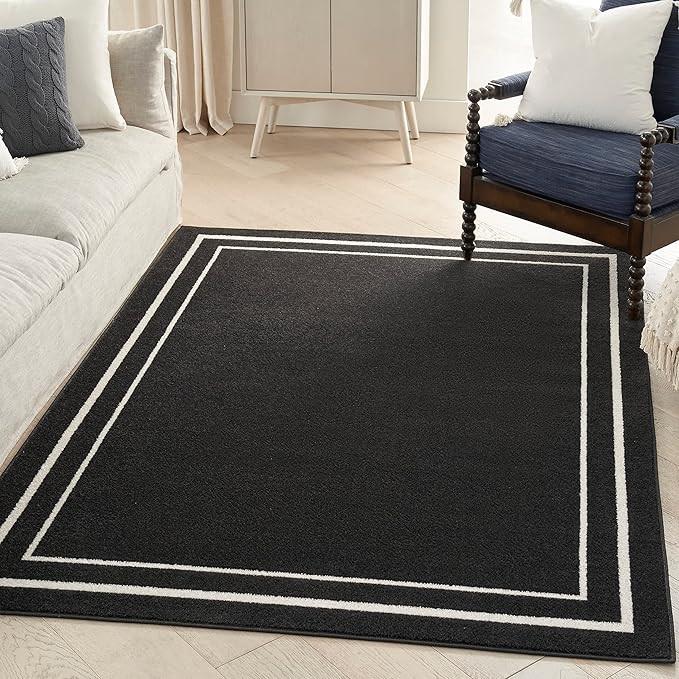Nourison Essentials Indoor/Outdoor Solid Bordered Black Ivory 5' x 7' Area Rug, Easy Cleaning, No... | Amazon (US)