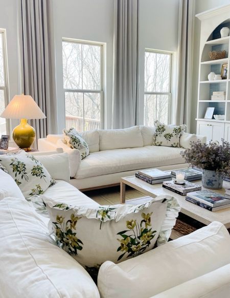 Family room decor - traditional home / southern home - home decor - white couches - floral pillows with ruffle details 

#LTKHome #LTKOver40