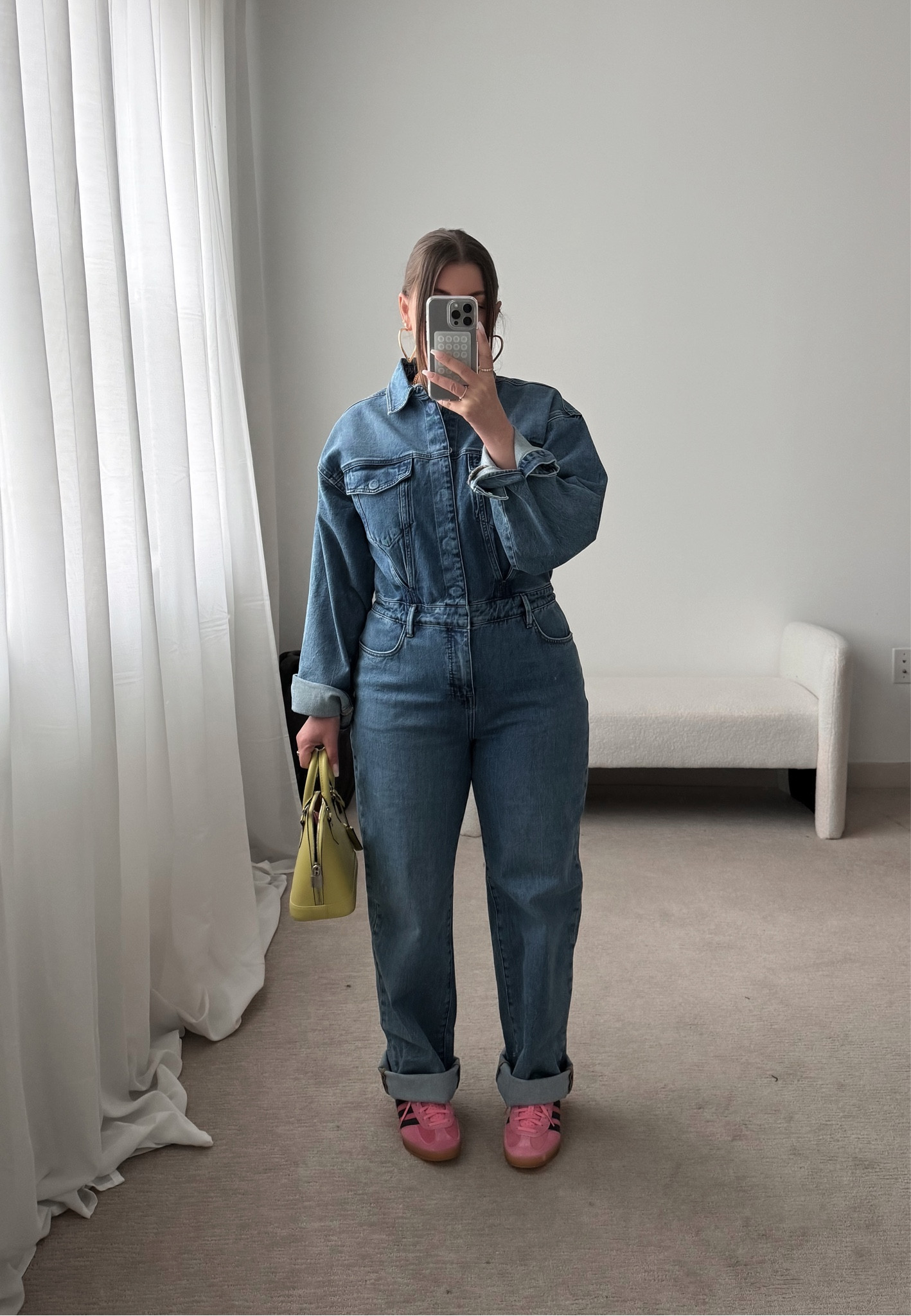 I’m wearing the S/M in this denim jumpsuit. Medium is my true size

