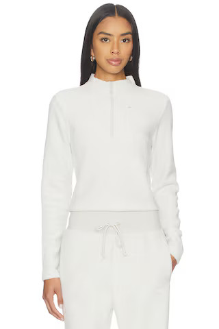 Nike Slim Long Sleeve Cozy Fleece 1/2 Zip Top in Light Bone & Sail from Revolve.com | Revolve Clothing (Global)
