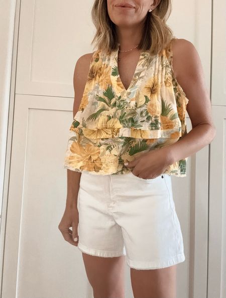 Floral tank under $100 and I’m wearing a size small
Summer outfit with white denim shorts 

#LTKFindsUnder100 #LTKStyleTip