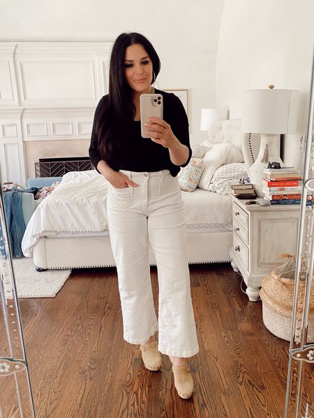 Wide leg white pants with beige clog shoes, black 3/4 sleeve shirt


#LTKover40 #LTKworkwear