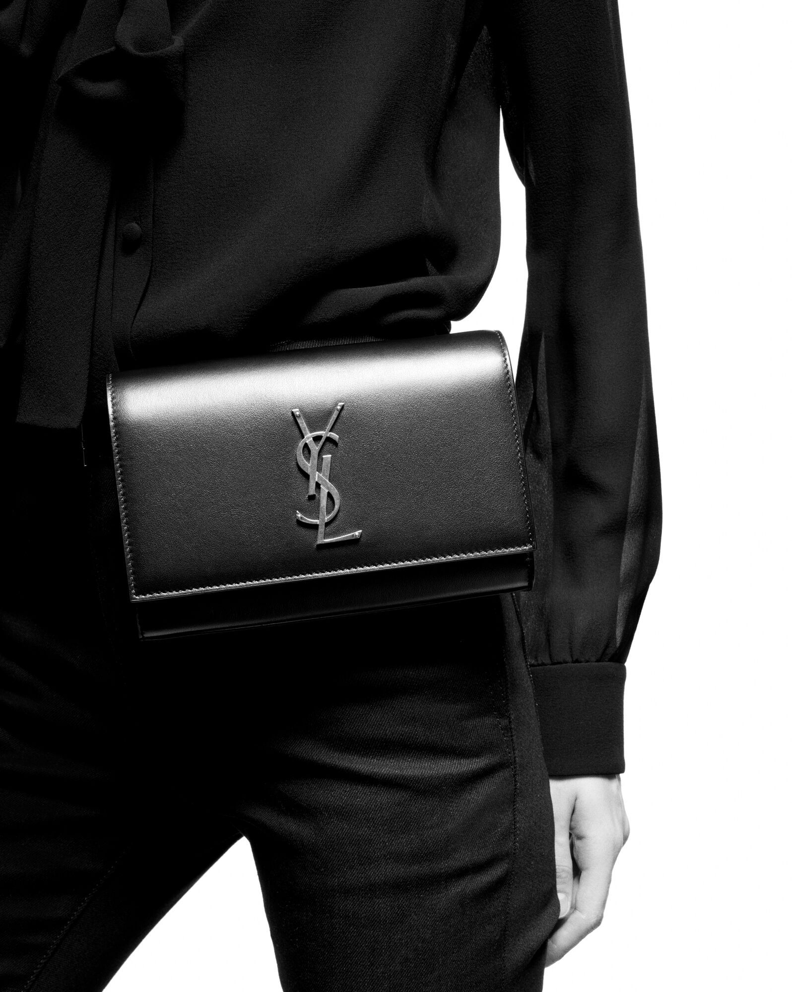 Adjustable belt bag made with metal-free tanned leather and organic cotton lining, featuring a de... | Saint Laurent Inc. (Global)