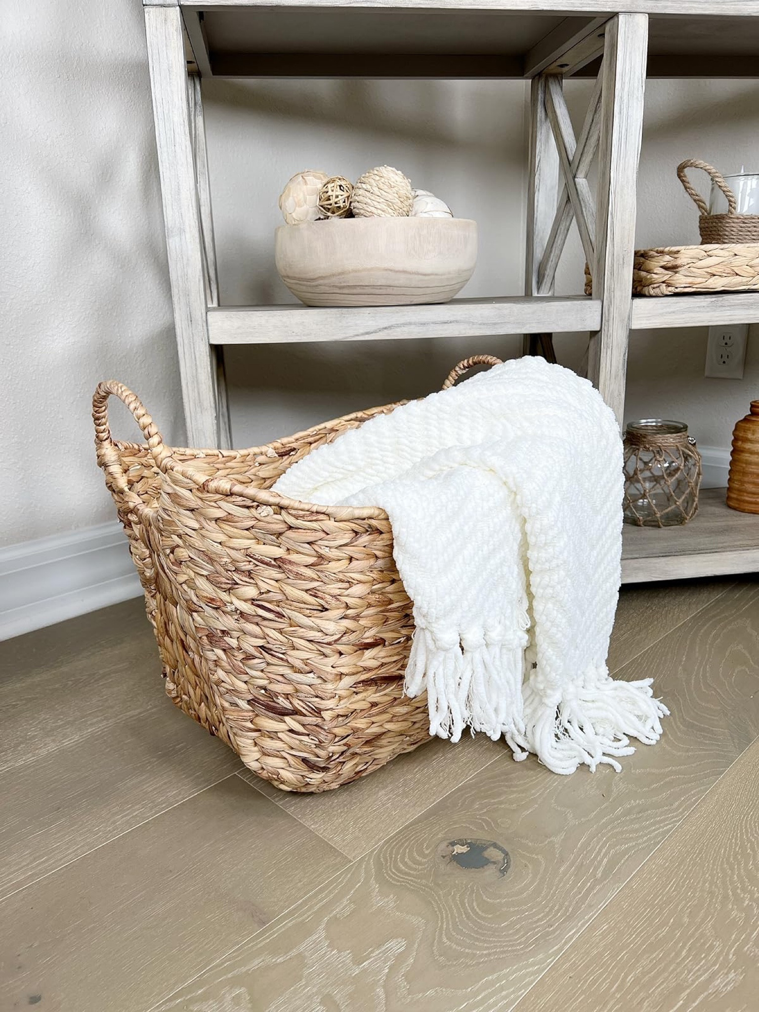 Pretty tall water Hyacinth basket is perfect for blanket storage. #amazon #amazonhome #founditonamazon #baskets #basket #blanketstorage #storage #coastalgrandmother #homedecor #coastaldecor #coastal #home

#LTKhome