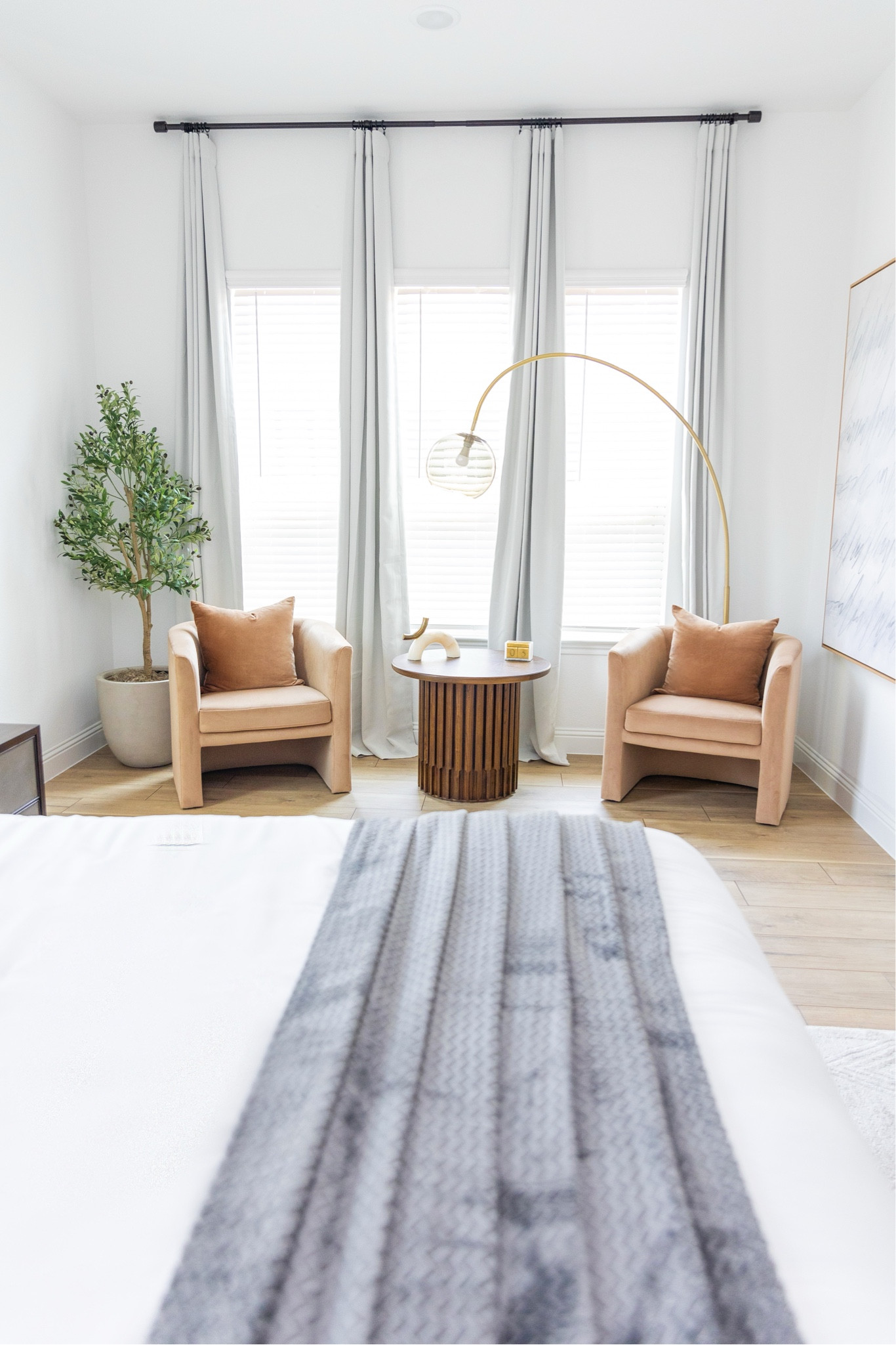 Shop my bedroom nook 💕 camel accent chairs, fluted side table, ached lamp and grey curtains. 

#LTKhome #LTKU #LTKFind