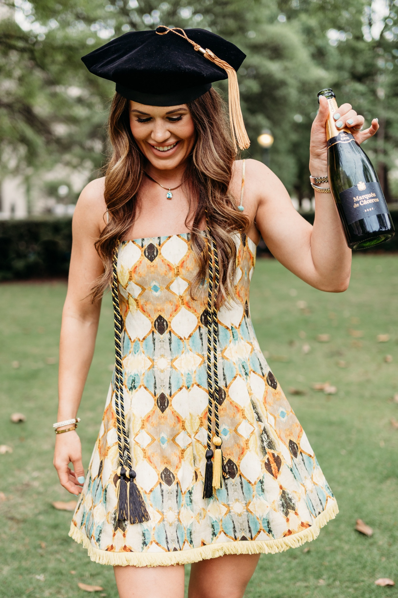 This dress looks like a hand painted canvas and I’m obsessed with all the detail. So so cute! Runs TTS. 

#graduationdress 

#LTKwedding #LTKstyletip