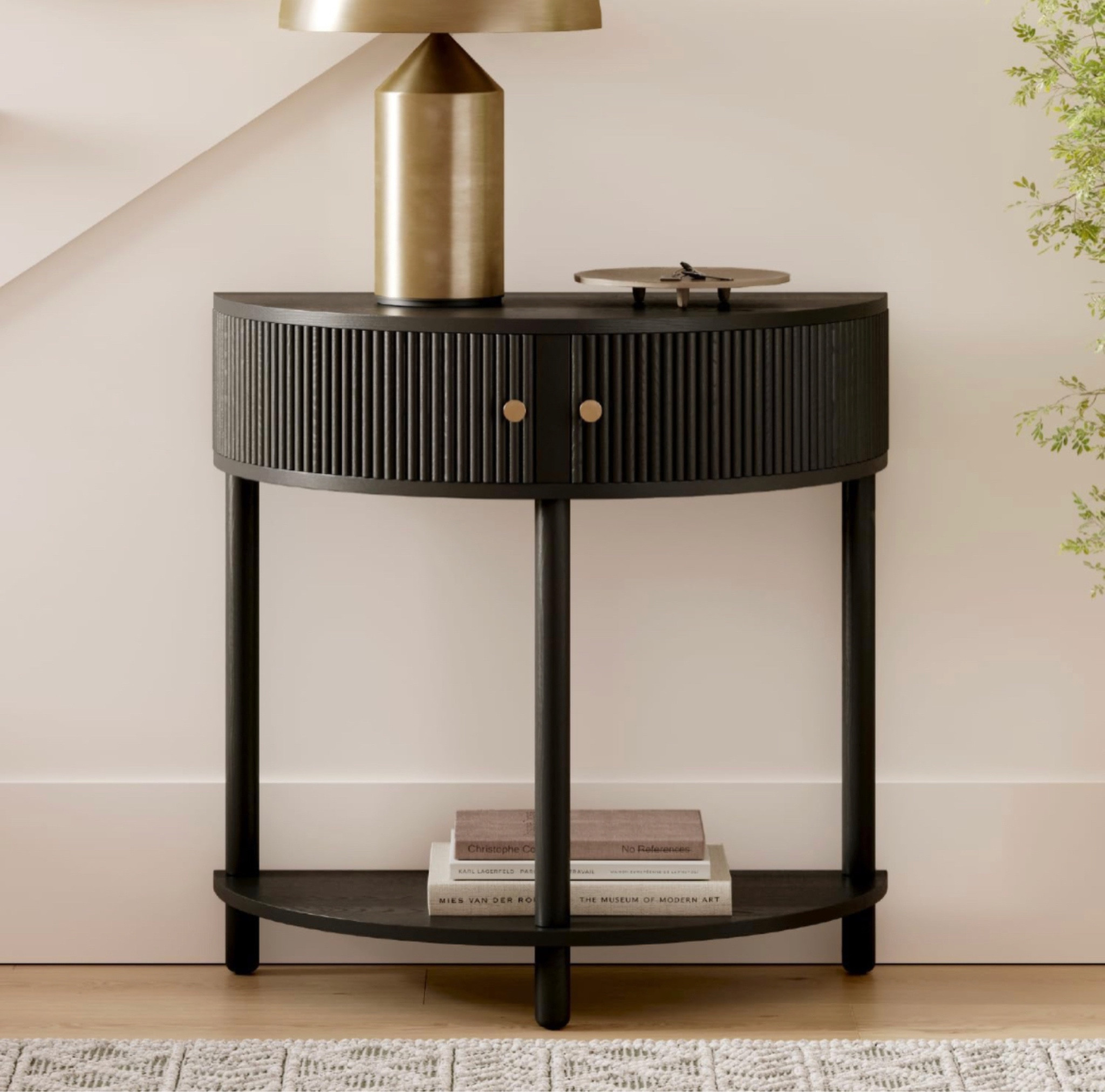 Love the reeded detail on the small console table! Comes in both black and a rich brown! Under $230!

#LTKfamily #LTKhome #LTKsalealert