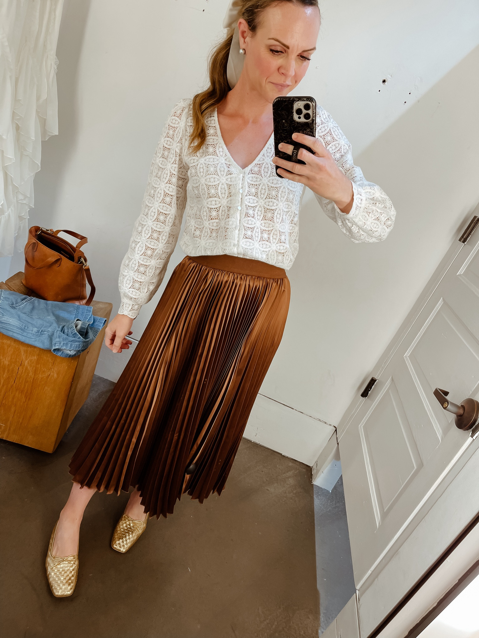 Pleated skirt from Anthropologie. Runs generous, wearing an XS but could do an XXS. 

#LTKSeasonal