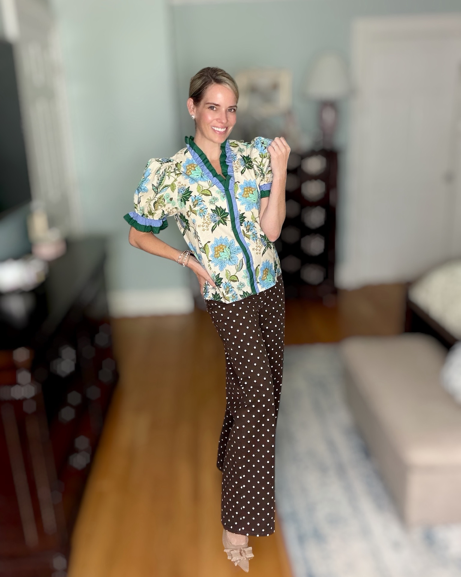 💙 Floral Ruffle Blouse with Polka Dot Pants

A little vintage, a little preppy, and so easy to wear! 💙🌿 This floral ruffle blouse is full of beautiful details—from the statement puff sleeves to the contrasting green and blue trim. I paired it with chocolate brown polka dot pants, pearl bracelets, and neutral slingback heels for a look that’s polished enough for brunch, the office, or dinner out.

I love mixing playful prints, and the florals with the subtle polka dots create such a fun, elevated outfit without feeling too busy. ✨

🤍 Linked:
• Floral ruffle blouse
• Brown polka dot pants
• Neutral bow slingback heels
• Pearl stretch bracelet stack

Floral blouse, puff sleeve top, ruffle blouse, preppy style, feminine fashion, chic work outfit, brunch outfit, office style, fall transition outfit, polka dot pants, Amazon fashion finds, classic style, women’s fashion, elevated everyday outfit.

#LTKOver40 #LTKPetite #LTKootd