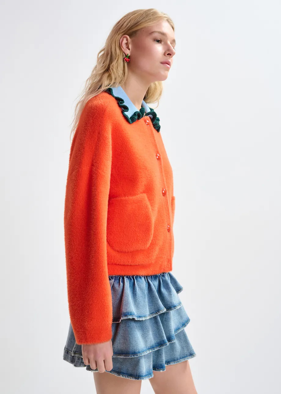 Orange cardigan with contrasting light blue and dark green ruffle collar | Essentiel Antwerp Unit... | Essentiel Antwerp