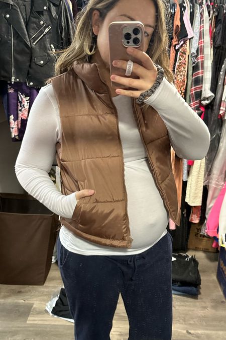 Affordable puffer vest comes in 4 colors! Wearing a medium, my true size pre-pregnancy. Love this Brown Ginger color. Lightweight and yet so warm! Cropped puffer vest. Bump friendly  

#LTKbump #LTKfindsunder50 #LTKGiftGuide
