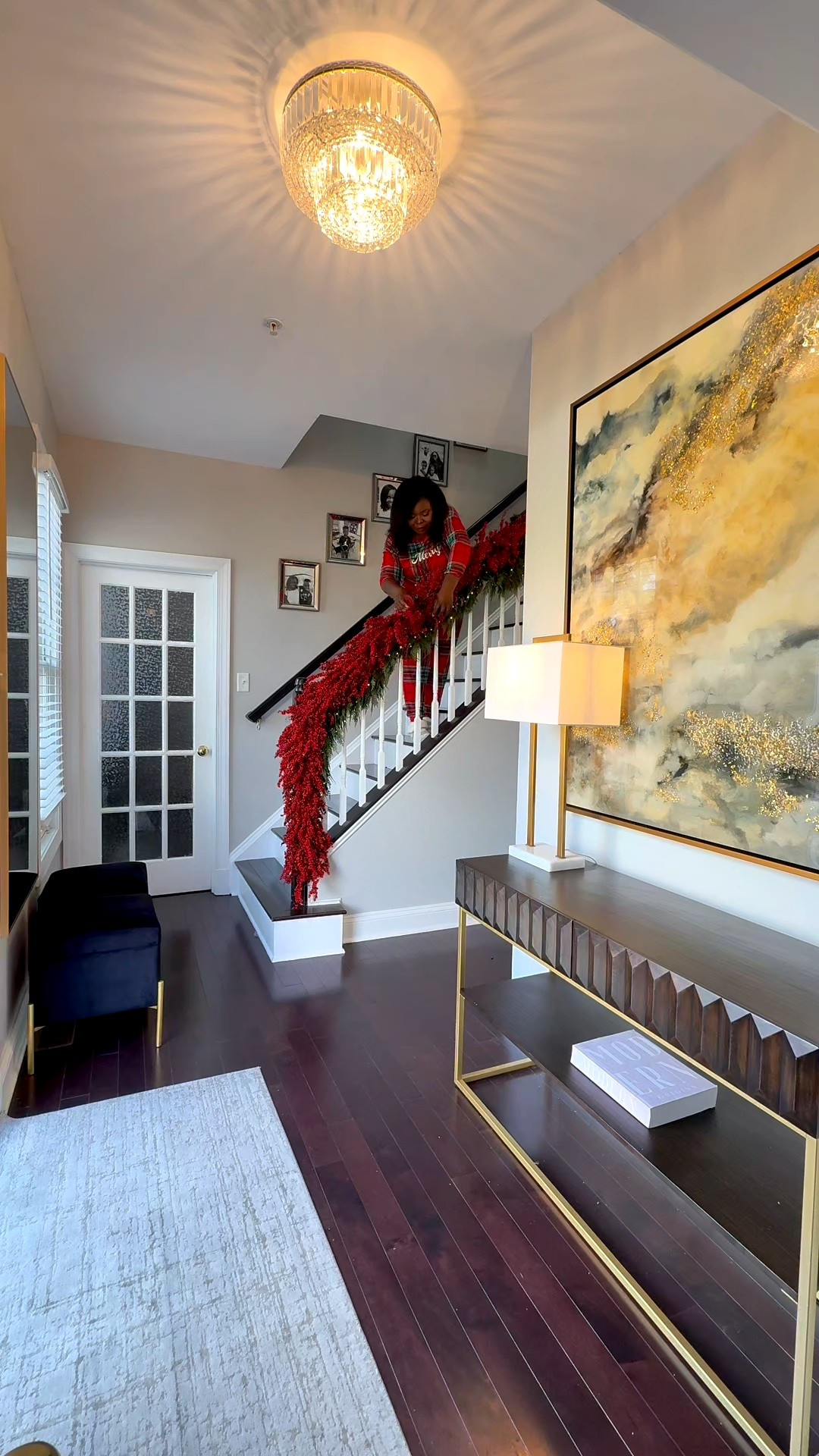 There’s something about adding garland on the stairs that instantly makes the house feel like Christmas ❤️This was how I styled my entryway last year, using these red berries and I just love the way it turned out. Should I use this again this year? 🤔 #christmasdecor #entryway 

#LTKHoliday #LTKSeasonal #LTKGiftGuide
