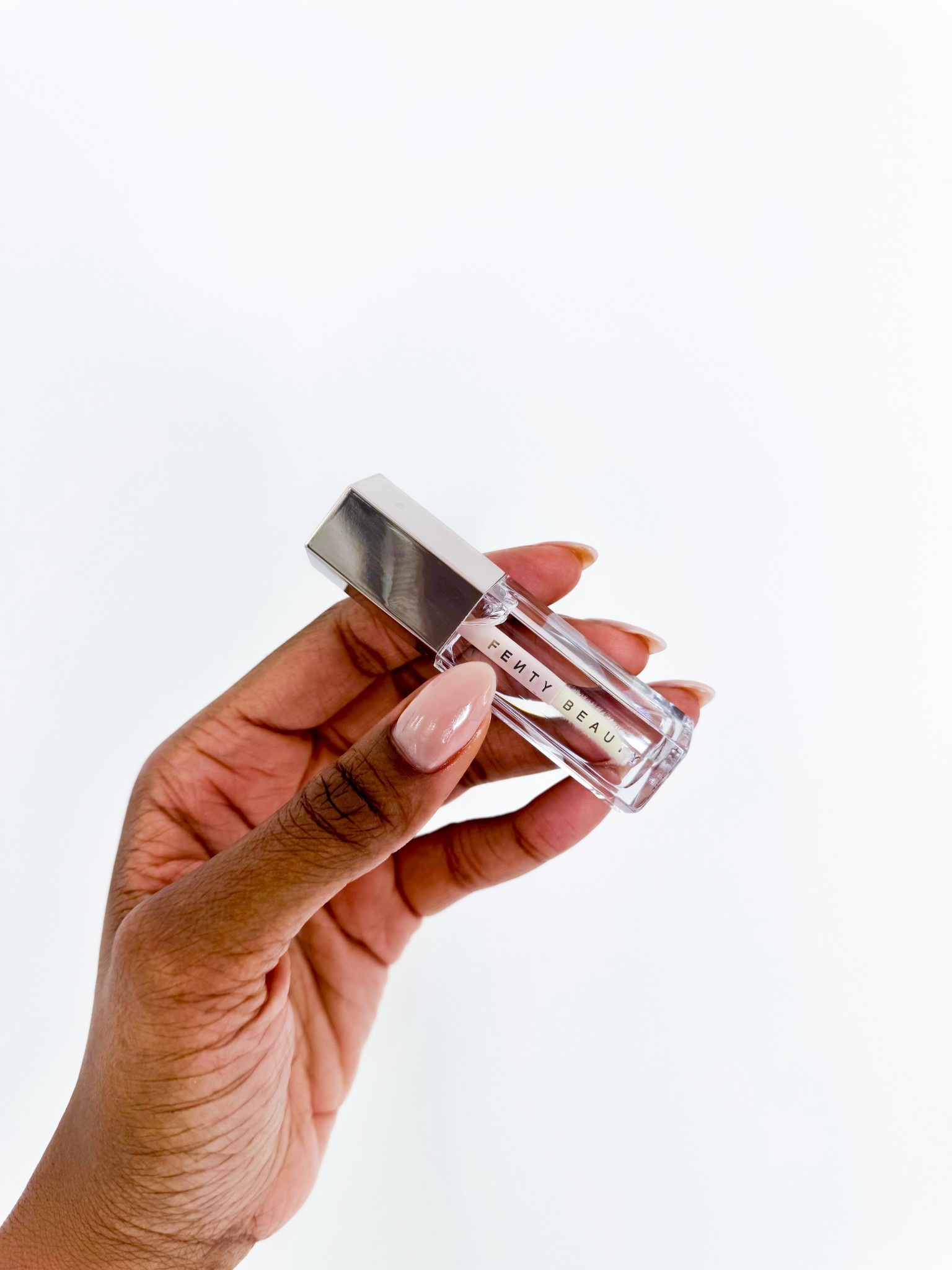 Clear Must have Gloss from Fenty Beauty! Not too thick, doesn’t leave a white residue and it’s a reasonable price! 

#LTKSummerEdit #LTKBeauty #LTKFindsUnder50