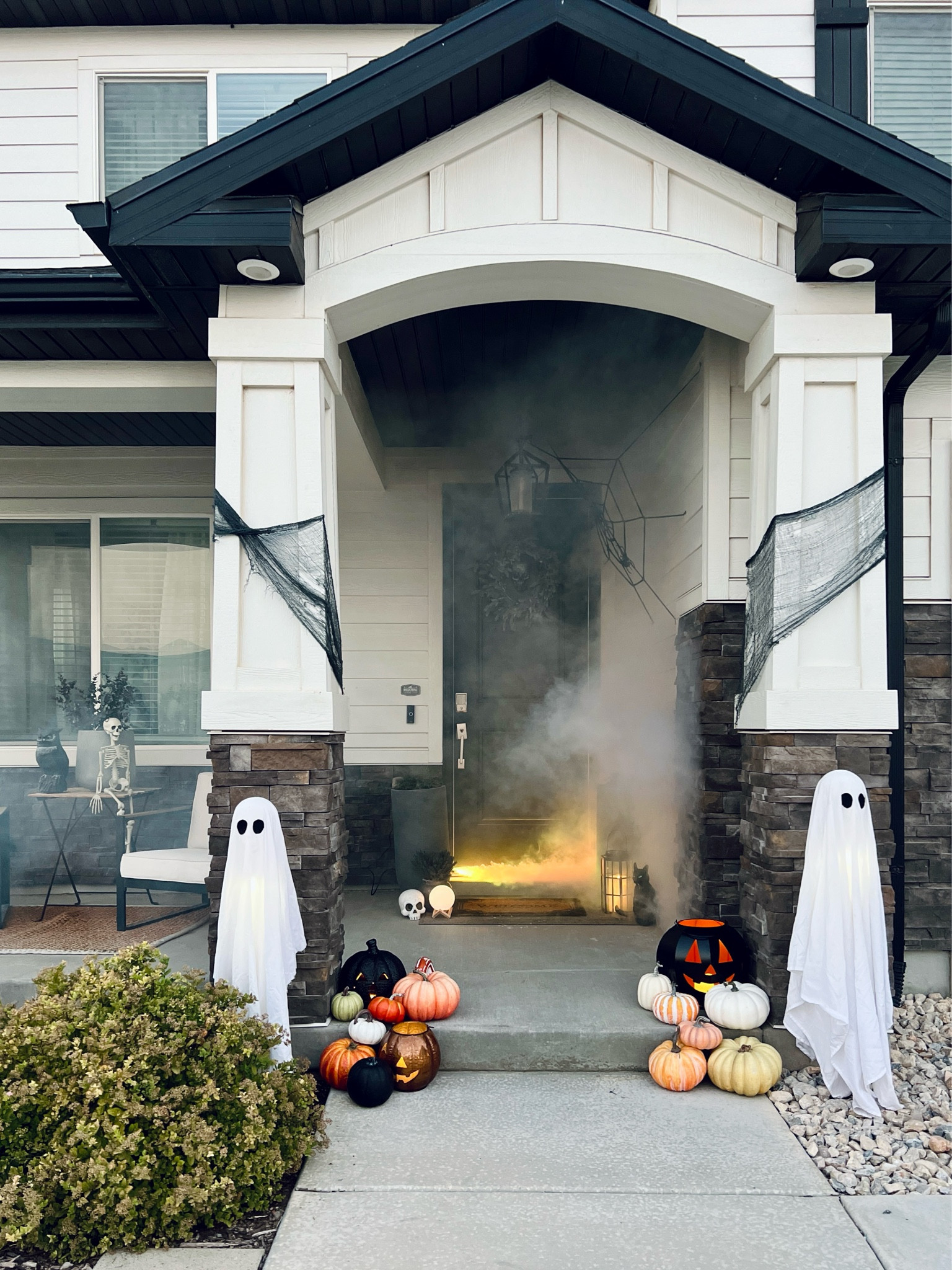 Our Halloween porch this year! The fog machine could standalone as the decor tbh but I love the whole effect. 

I basically raided the shelves at Michael’s, because I love it there and EVERYTHING is on sale.

Fog machine with lights and remote
Fog juice liquid fog fluid
Black metal jack-o-lantern with lights
Bronze metal jack-o-lantern
Stake ghosts
Faux pumpkins 
Skull door knocker
Faux black cat
Black glass lantern
LED candle with drips
Hanging 20in skeleton
Dark faux eucalyptus
Elastic spiderweb
Faux black widow spider
Moon lamp
Halloween decor ideas 
Puck lights with remote

#LTKFallSale #LTKHalloween #LTKSeasonal