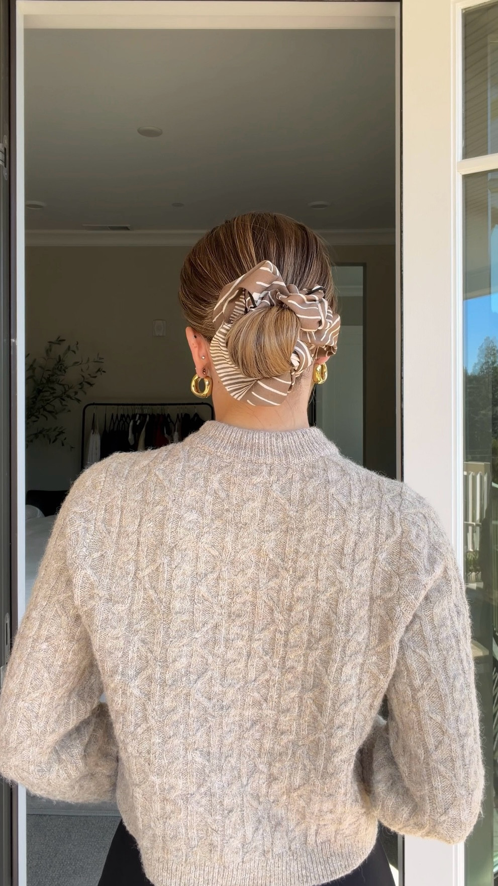 How to make a scrunchie bun look chic this fall 🍁

Gather your hair into a low ponytail. Wrap a scrunchie over it and twist one time. Hold your index finger above the base of the scrunchie and wrap your ponytail around it to form a bun. Tuck the ends behind the scrunchie, then pull the excess scrunchie over the bun to secure. Effortless, chic, and perfect for fall. Consider this your sign to wear a scrunchie again! 💁‍♀️

#LTKBeauty #LTKSeasonal #LTKFindsUnder50