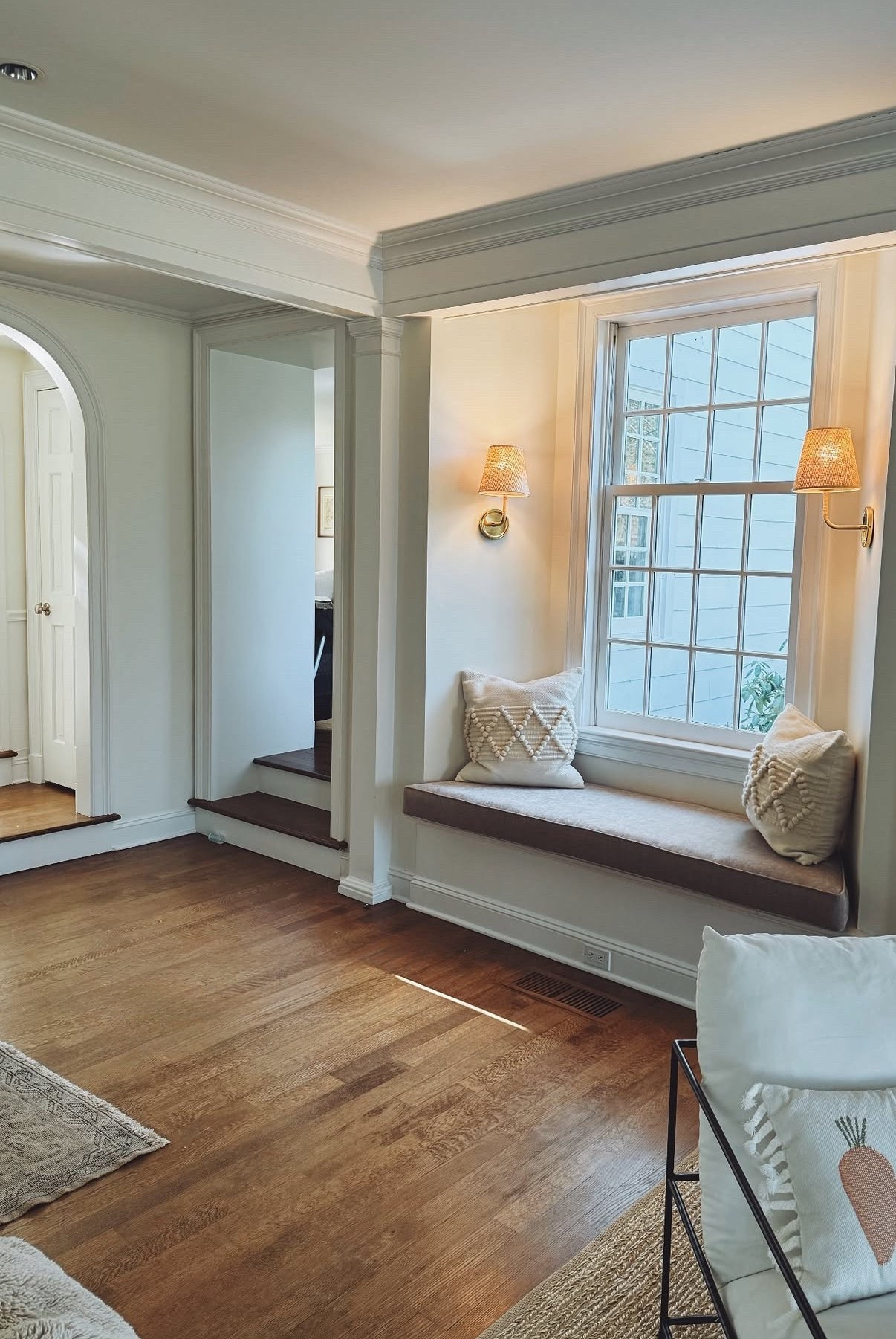 Finally added some pretty lighting to this little nook in our living room
-exact pillows are old Arhaus, linked similar 
-bench cushion was custom 
-paint color is BM Swiss coffee at 75% strength 
-floors were matched to Early American from minwax

#LTKHome