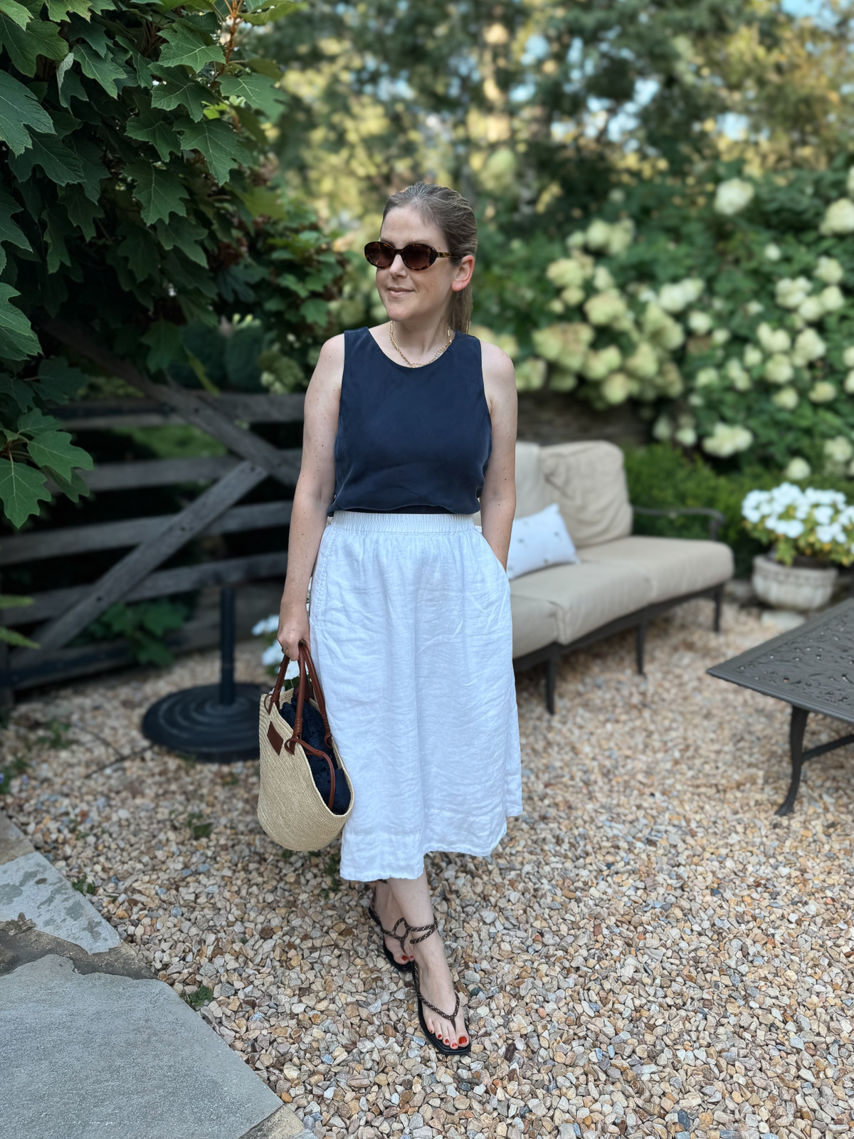 My navy top is super breathable so you can wear it now and layer over it in the fall. There's also a matching button up! I wore this to a lunch, but it's actually perfect for work.  

 #LTKmomlife #LTKOver40 #LTKWorkwear